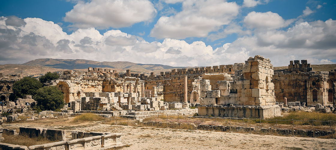 Ancient ruins under a cloudy sky