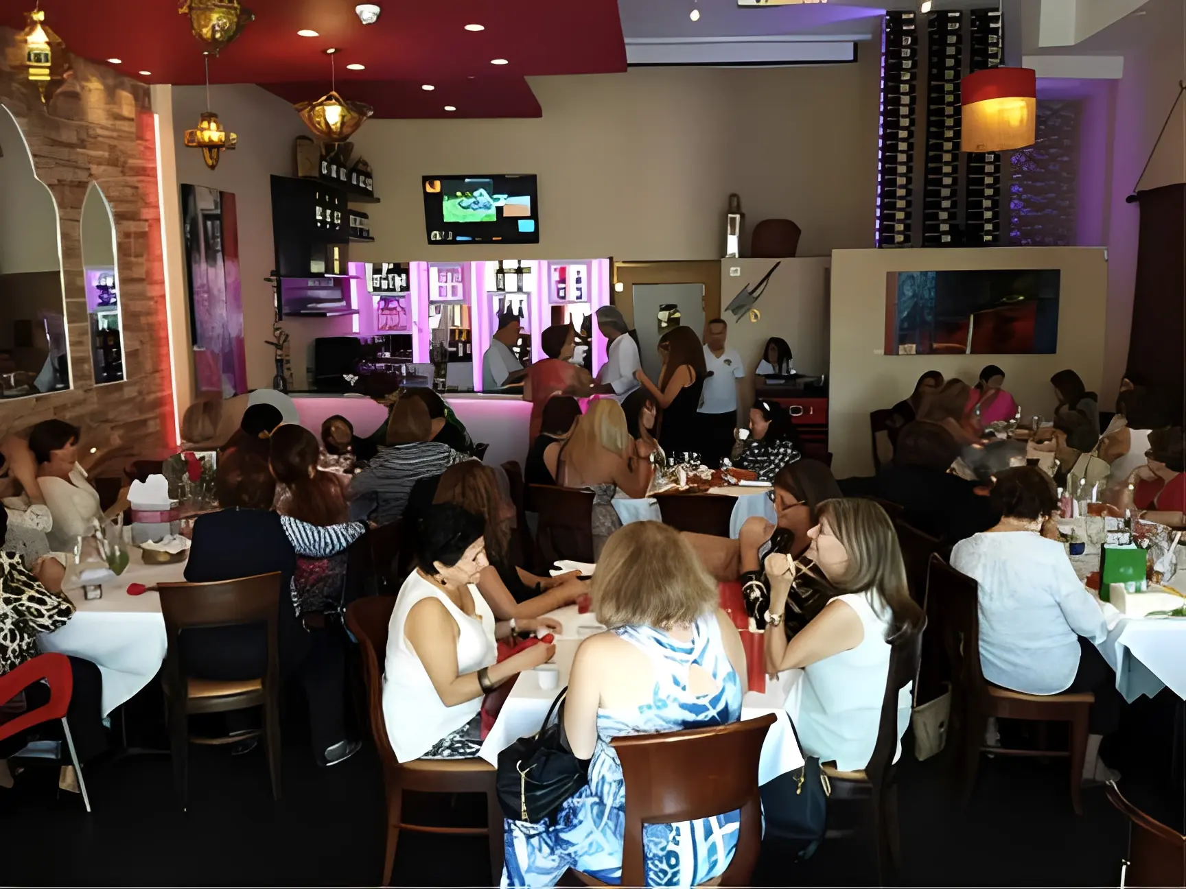 Busy restaurant interior with diners